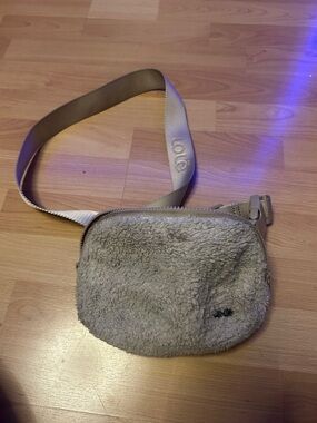 Lolë Beige Sherpa Crossbody Belt Bag with Branded Strap
